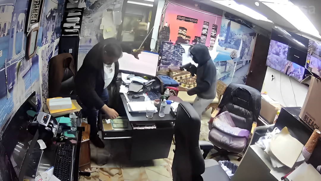 Caught on Camera: Masked Gunman Steals $30,000 and Important Documents in Paterson Robbery