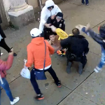 Shocking NYC Incident: Armed Migrants Clash with Police, Walk Free After Arrest!